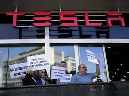 Tesla showrooms attack: Elon Musk backlash reaches breaking point as  protesters target Tesla showrooms with Molotov cocktails and gunfire in  growing protest across U.S - The Economic Times