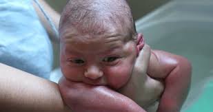 Begin washing her face carefully with the washcloth, using warm water, and how often should we bathe our baby? Asian Baby Infant Lying On Stock Footage Video 100 Royalty Free 1039229738 Shutterstock