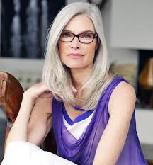 Messy updo with free locks. 30 Fabulous Hairstyles For 50 Year Old Woman With Glasses
