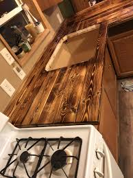 Pin By Chad Susil On Burnt Wood Counter Top Diy Home Interior Projects Diy Wood Countertops Wood Home Decor
