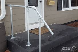 The base plate and heavy bottom tube are designed to take the extra stress of having only a single post. 14 Exterior Handrail Ideas Simplified Building