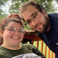 What company was driving the blue semi with an unsecured load