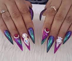 Jewel Toned Crystal Holographic Chrome Long Sharp Stiletto Nails Stiletto Nails Nails Halloween Nail Designs