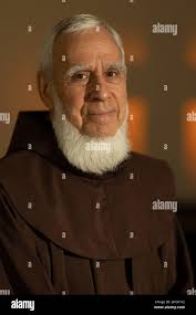 Brother David Schlatter, from Silver Spring, Maryland, a Franciscan priest  at Walter Reed National Military Medical Center (WRNMMC), poses for a photo  in the chapel at Walter Reed National Military Medical Center