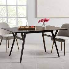 Each leg tapers down towards the bottom. Mid Century Expandable Dining Table Dark Mineral