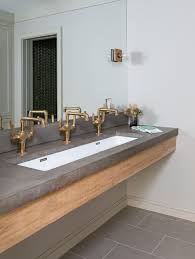 Each unique sink comes from a single piece of wood. Salvaged Wood Bathroom Vanity Design Ideas
