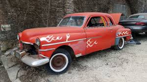 this 1950 chrysler coupe in illinois is a junkyard gem autoblog this 1950 chrysler coupe in illinois is