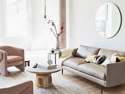 Large sectional + compact chairs. 6 Furniture Layout Mistakes That Instantly Cheapen Your Home