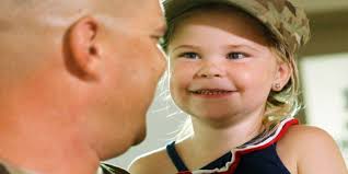 Soldier reunited with his family at RedHawks game