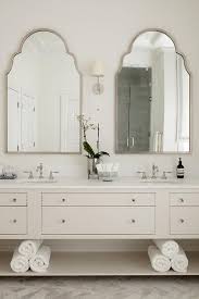 Choose from contactless same day delivery, drive up and more. To Silver Arch Mirrors Flank A Nickel Sconce Mounted Over An Ivory Double Washst Marble Decoration