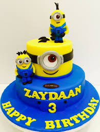 What better way to design a minion themed cake than creating a minion shaped cake? Minion Cake For 1st Birthday Novocom Top