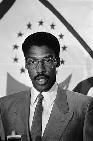 Doc in a 1986 press conference announcing his decision to re-sign with the  76ers for one final year after rejecting a 2-year, $2.48 million offer from  the Utah Jazz...