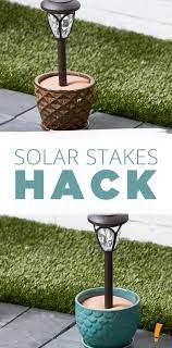 Instead Of Staking Your Solar Stakes In The Ground Put Them In A Pot To Line The Pathway To Your H Solar Landscape Lighting Outdoor Solar Lights Outdoor Solar