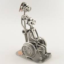 verpleegkundige met patient in rolstoel screenshots scrap metal art metal art metal tree wall art