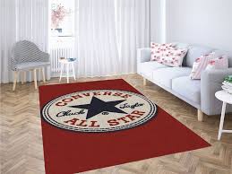 Modern formal living room with a stylish sofa set and white ceiling along with the carpet flooring. Converse All Star Logo Living Room Modern Carpet Rug