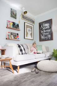 A Living Room With Kids Lay Baby Lay Family Friendly Living Room Kid Friendly Living Room Kids Living Rooms