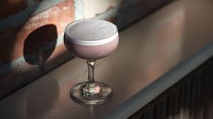 While the modern preparation of this drink includes an egg white, the original was made with soda. Sloe Gin Fizz Punch