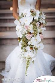 White Orchids And Pink Roses Bridal Bouquet Ideas Bridal Bouquet Flowers Orchid Bouquet Wedding White Orchid Bouquet