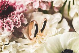 Pictures of bridal bouquets with wedding rings. Close Up View Of Wedding Rings In Bridal Bouquet Free Stock Photo And Image