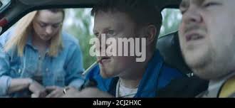 THE OWNERS, from left: Maisie Williams, Ian Kenny, Andrew Ellis, 2020. ©  RLJE Films /Courtesy Everett Collection Stock Photo