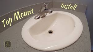 Round bathroom ceramic counter top wash basin sink cloakroom porcelain vanity vessel bowl. How To Install Bathroom Sink Top Mount In Quartz Youtube