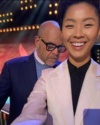 I had exactly one phone call and one day to get acquainted with the man who  has hosted Iron Chef America by himself for nearly 15 years before I had to  stand