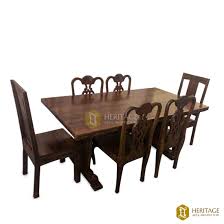 The table and chairs are made from solid birch, mango, and rubberwood in a cream finish for a country cottage aesthetic. Wooden Dining With Table French Style Chairs Heritage Arts And Architecture Kochi Kerala India