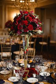 When considering ideas for wedding reception table centerpieces, most people will think of flowers. Tall Centerpiece Ideas Red Roses Gold Accents Calla Lilies Romantic Wedding Ideas Christmas Tree Decorations Cool Christmas Trees Black Christmas Trees