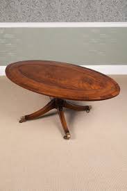 This rustic wood coffee table is fully handmade. Antiques Atlas Oval Mahogany Coffee Table