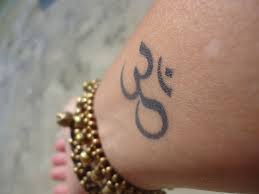 Birthmark On Leg Meaning In Hindi Om Tattoo Om Tattoo Om Tattoo Design Tattoos