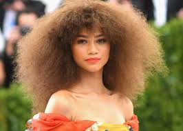 It had a sleeveless black bodice, and a red miniskirt with embroidered suns. Teen Choice Awards 2017 Zendaya Used Her Acceptance Speech To Send A Message To Young People Glamour