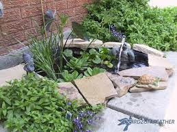 Gentle curves at the edge of the fountain soften the hardscape edges. 22 Outdoor Fountain Ideas How To Make A Garden Fountain For Your Backyard