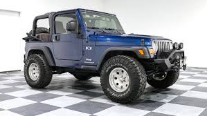 Image result for Patriot Blue 2004 Jeep