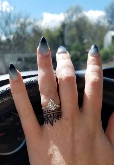 Tattoo around wedding ring | Ring finger tats for women, Feminine wedding band tattoo, Tattoo women finger