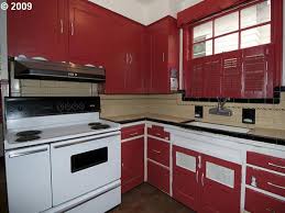 My kitchen is very similar, in fact i have the same pendants over a lighter gray island in my kitchen surrounded by white shaker style cabinets! A Sustainably Minded Portland Kitchen Remodel Hgtv