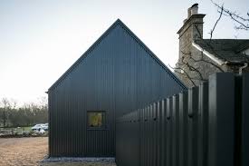 Not necessary if you have rubber pan but i chose to for extra protection. Corrugated Metal Extension By Eastabrook Architects Detached Houses