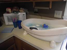 The ducks float on top of the punch, for a cute bubble bath scene adorable for a 1st birthday or duck baby shower. Ahaha Too Cute Of An Idea Punch In A Baby Bathtub Congratulations Baby Baby Bath Tub Baby Shower