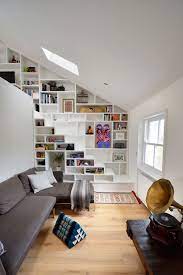 This floating staircase aligns each step with each shelf creating a cool structured and graphic 3. Super Creative Under Stairs Storage Ideas Shelves And Cabinet Design