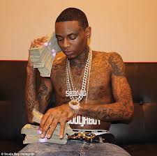 Soulja boy's new pictures reveal that he has tattoos on: Soulja Boy Gets Laser Treatment On His Face To Remove Gucci Tattoo From His Forehead Daily Mail Online
