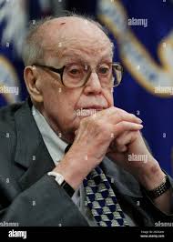 Deputy Assistant Attorney General in the Criminal Investigation, John C. "Jack"  Keeney, listens to speeches during his retirement ceremony honoring his 59  years of service and leadership to the Department of Justice
