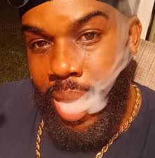 nas rocking the green and orange renegade pelle pelle to perfection .  🔥🔥🔥🔥🔥🔥🔥🔥🔥🔥🔥🔥🔥