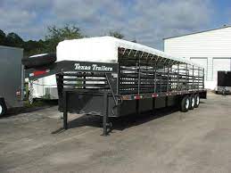 This 24 ft rancher tr from sundowner features a front tack with saddle racks, matted floor throughout, 7 ft interior height, mag wheels, 2 x 10ft compartments, window in nose, spare tire and mount and its covered by sundowners. St3221g Texas Trailers 32 Gooseneck Stock Trailer W Triple Axles Near Me