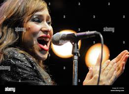 Female singing at talent show hi-res stock photography and images