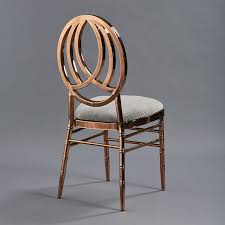 Metal chairs with simple style and black color, which will add a more classic atmosphere to your house or restaurants. Rose Gold Phoenix Chair With Steel Velvet Patented Design Nuage Designs