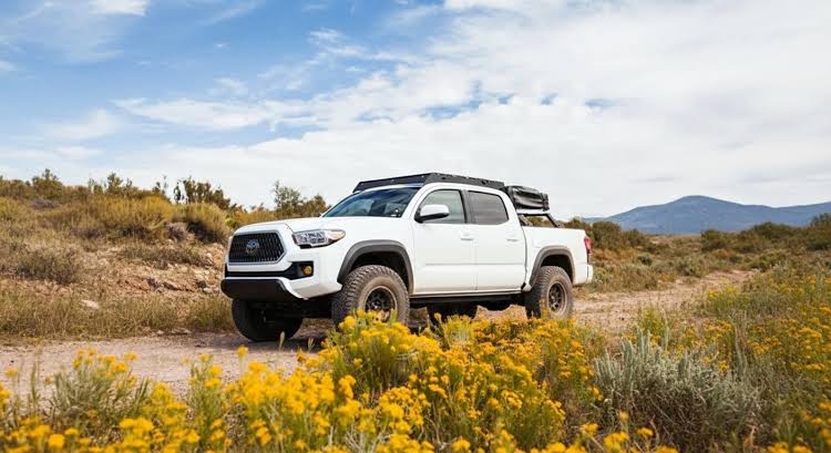 Off-road modifications enhance ground clearance and vehicle capability, AI generated