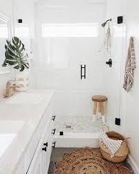 Where Bohemian Meets Modern On Instagram I Switched Out The Hardware To Black And Added Some Warm Tones T All White Bathroom Bathroom Style Bathroom Interior