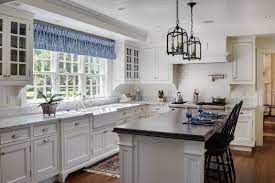 House cleaners in concord, ma range from general room cleaning all the way up to cleaning your attic. White Painted Kitchen With Marble Counters On The Perimeter And Wood Counter On The Island In Concord Ma Kitchen Layout Kitchen Remodel Kitchen Inspirations