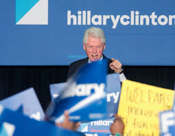 Find images of bill clinton. Bill Clinton Confronts Protesters