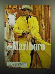 A giant bra was added to this camel ad in san francisco by billboard liberation front members who objected to the use of male bodies in ads. Pin On Marlboro Man Ads