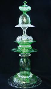 Glass Totem Something You Can Do With All That Yard Sale Glassware You Could Not Pass Up For 50 Cen Glass Garden Art Glassware Garden Art Glass Garden Flowers